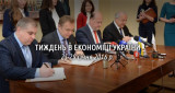 Андрій Садовий, директор Львівводоканалу та представники ЄБРР і Е5Р підписують договір про покращення надання послуг з очистки стічних вод у Львові
