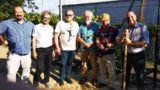 Учасники висадження суспільного виноградника у Винниках